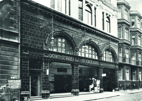 Black and white photo of the entrance of Down Street station